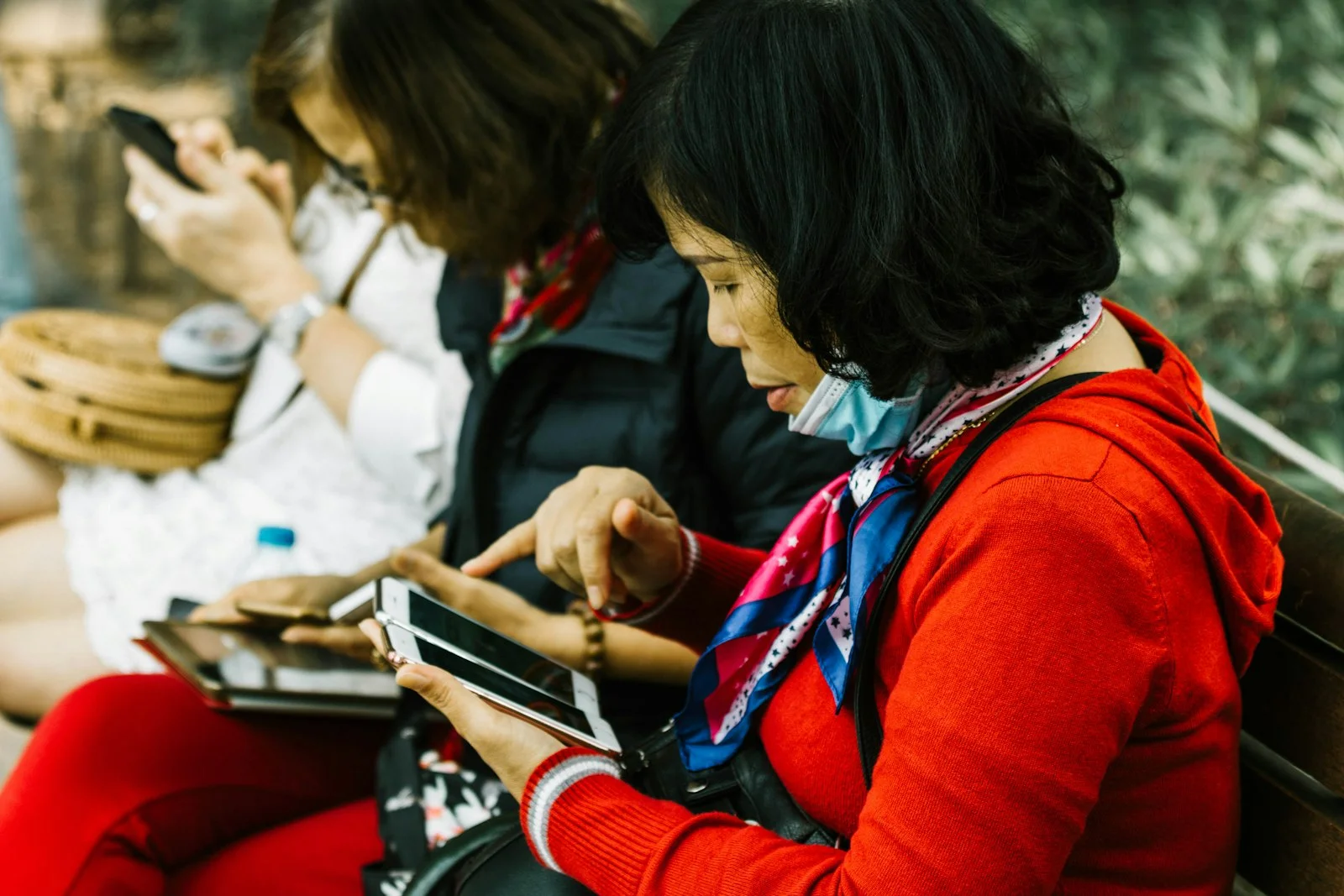woman using white smartphone woman using white smartphone